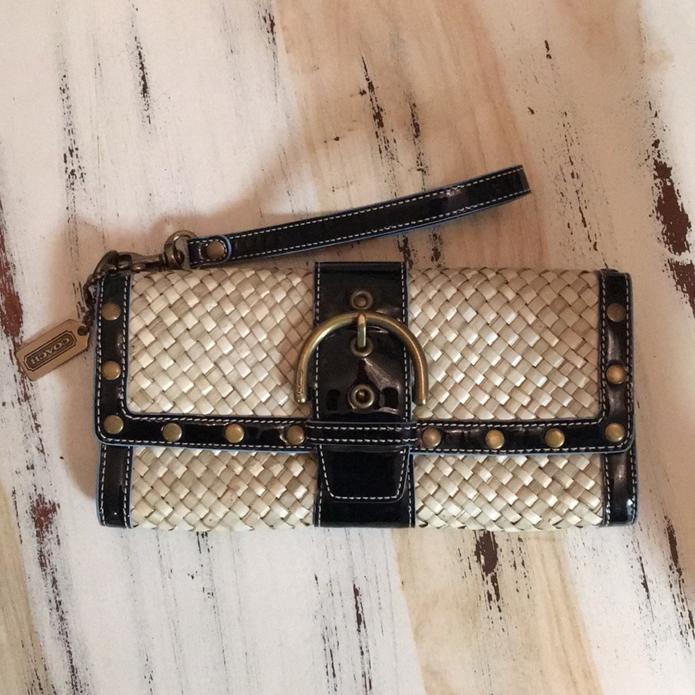 Straw clutch with black patten leather